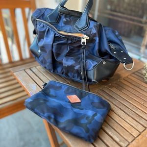 MZWallace. I’ve also worn it as a cross-body.